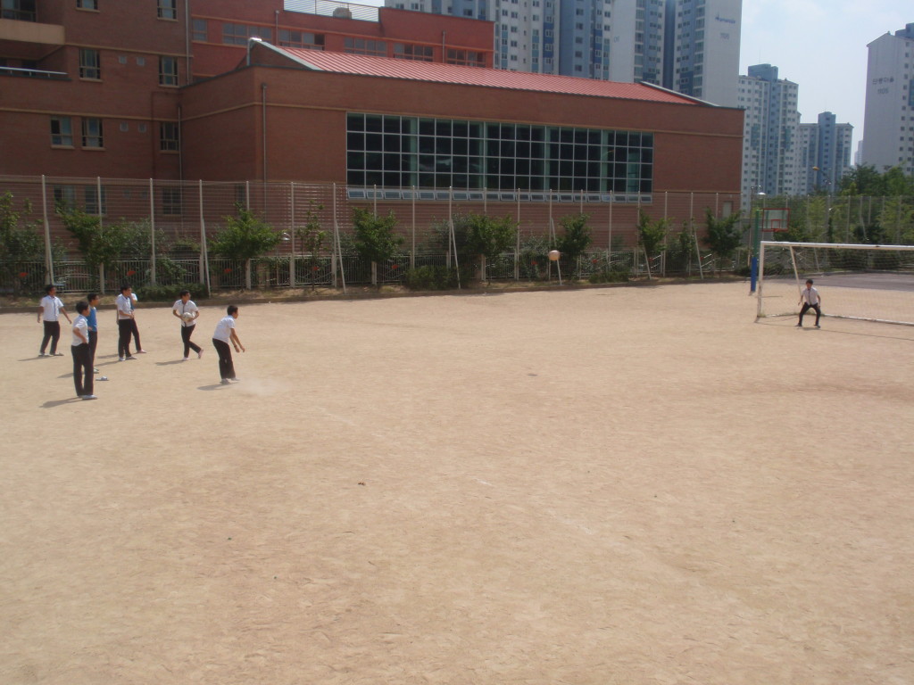 Korean kids playing soccer